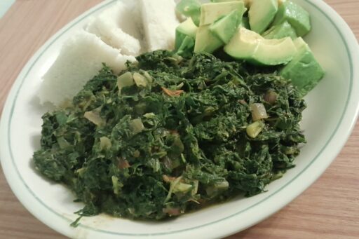 A plate of managu served with ugali