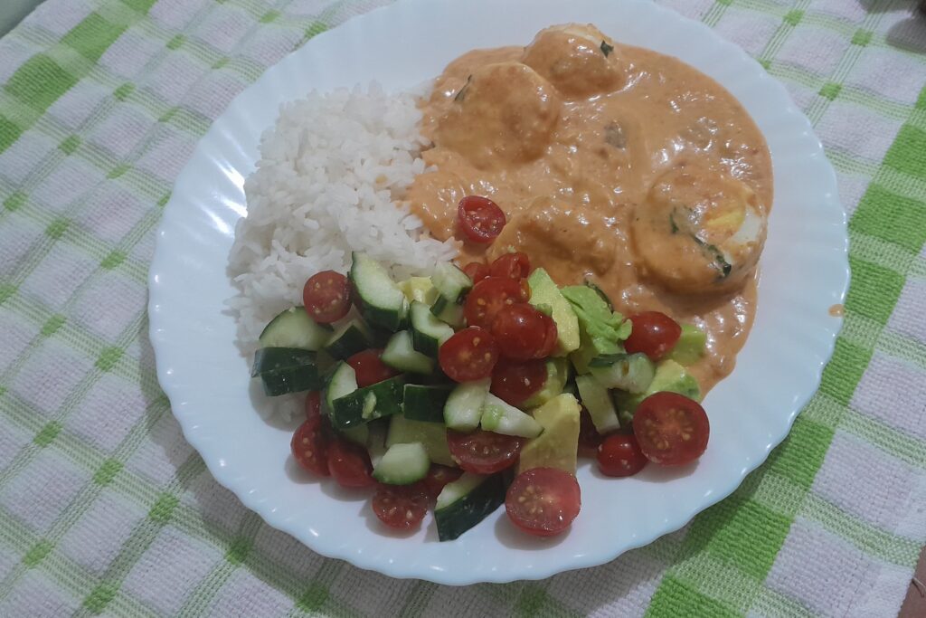 Coconut cream egg curry with rice